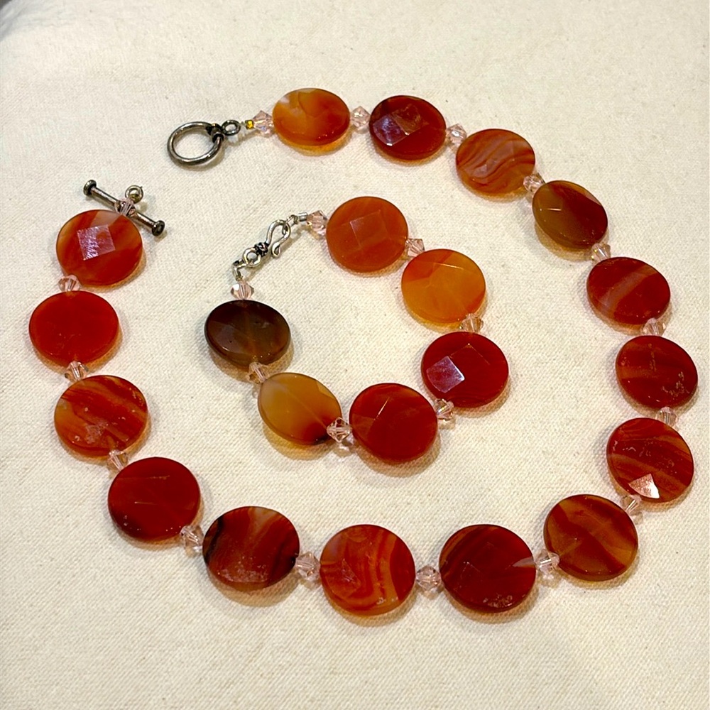 Orange agate multifaceted necklace with clear bead accents & matching br…